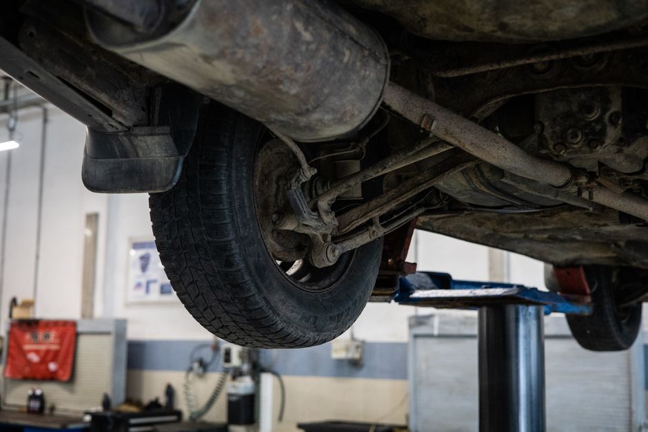 Mechanic performing tire installation and replacement