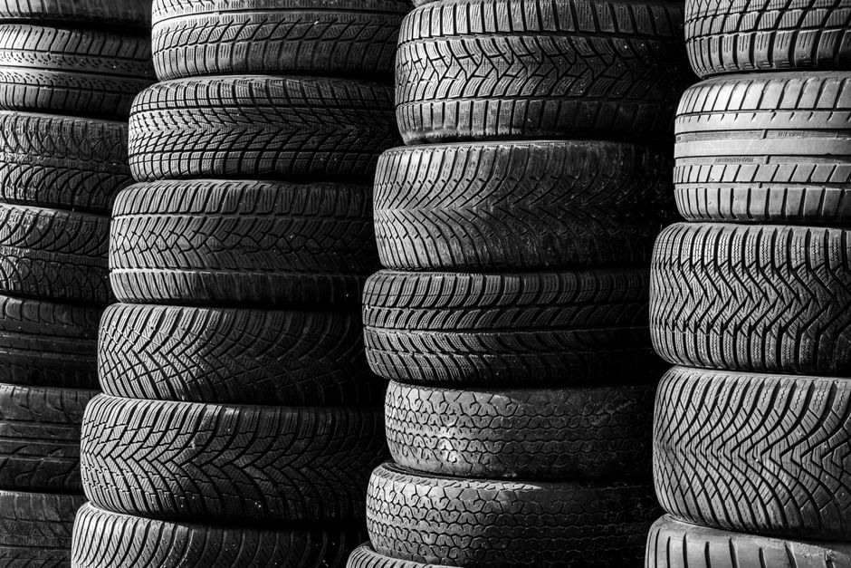 Stacked car tires in a secure storage facility